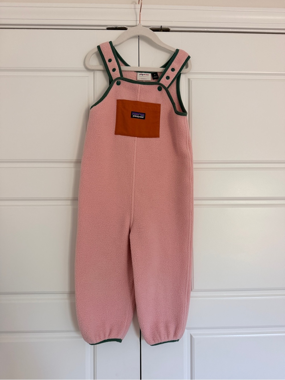 Patagonia Pink Fleece Overalls with Orange Chest Pocket and Green Trim